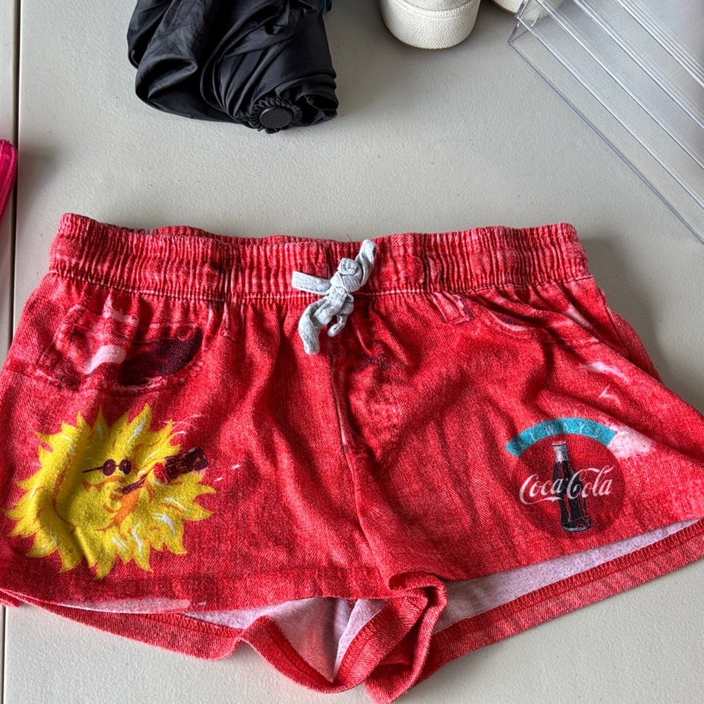 Coca-Cola Red Terry Lounge Shorts with Yellow Sun Graphic